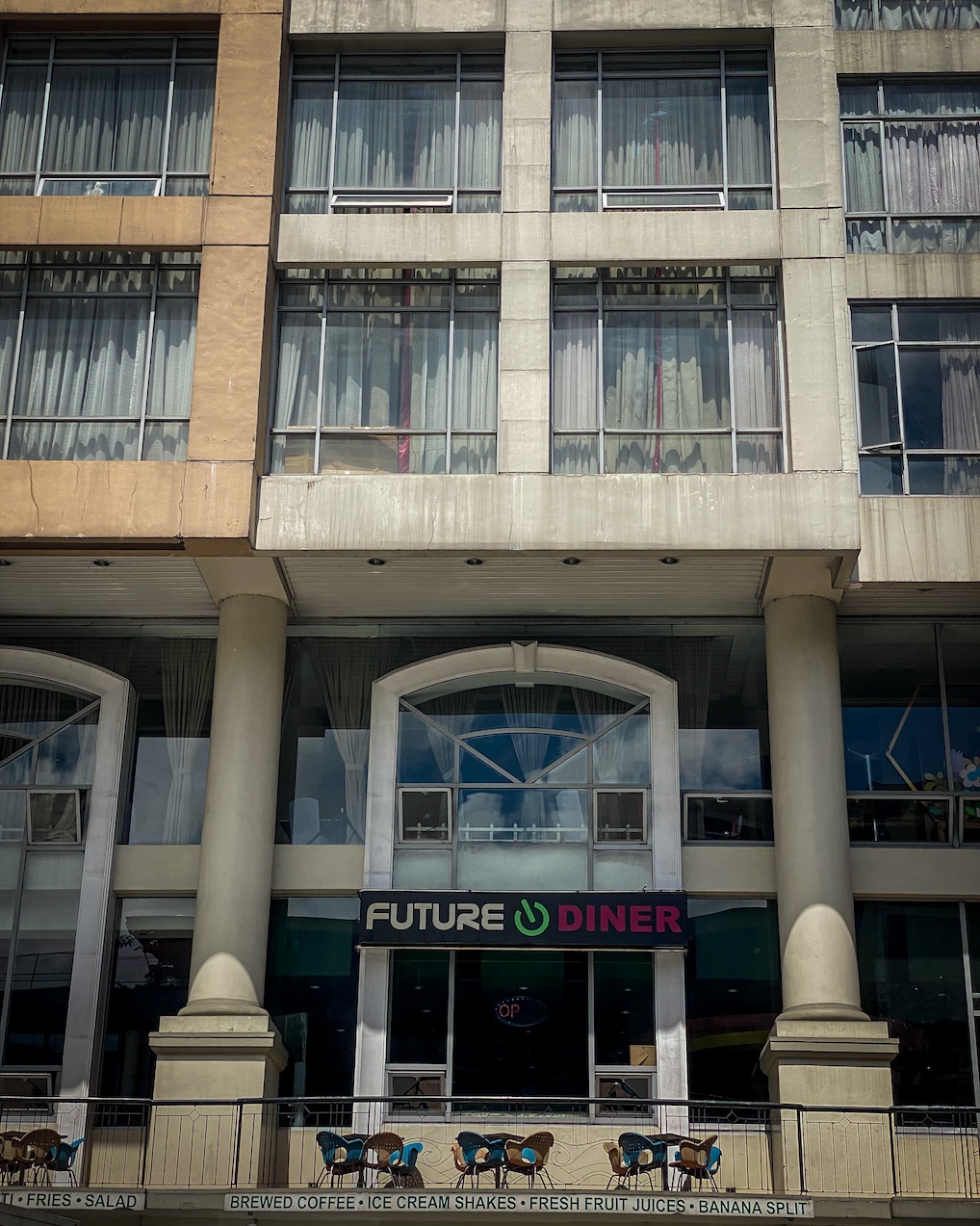Future Diner, a wide restaurant at the base of a tall building
