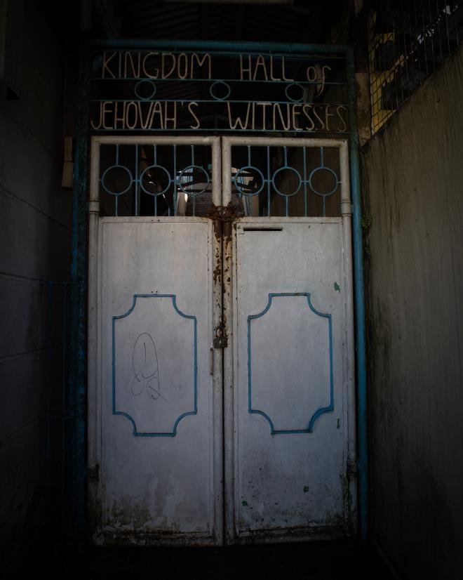 Locked gate of a kingdom hall